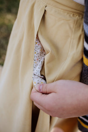 button-down skirt in mustard